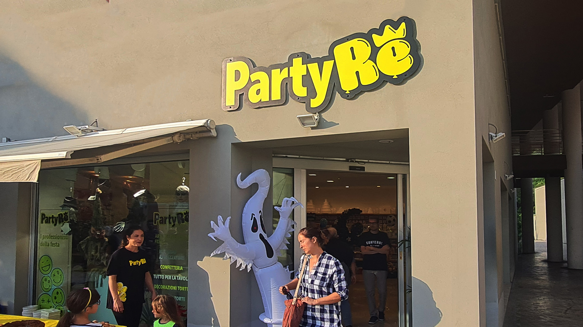 design insegna negozio Party Re Terni